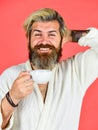 Guy in domestic clothes hold coffee cup. Bearded man with mug. Breakfast concept. Morning begins with coffee