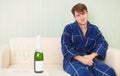 Guy in expectation of woman with sparkling wine Royalty Free Stock Photo