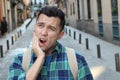 Guy experimenting intense toothache outdoors Royalty Free Stock Photo