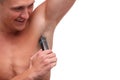 Guy with fur shaving underarm trimmer close-up on white isolated background Royalty Free Stock Photo