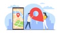 Guy and girl carrying large sign on map, changing office location, moving. Huge smartphone and tiny people. Location pin Royalty Free Stock Photo