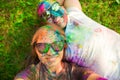 Guy with a girl celebrate holi festival, make selfie