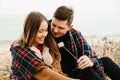 Guy and a girl eating marshmallows Royalty Free Stock Photo