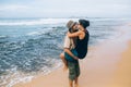 A guy and a girl are kissing on a beach Royalty Free Stock Photo