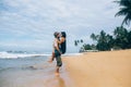 A guy and a girl are kissing on a beach Royalty Free Stock Photo