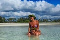 Guy and girl lie on the beach in the water Royalty Free Stock Photo