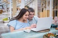 Guy and girl looking at laptop Royalty Free Stock Photo