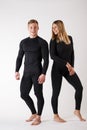 Guy and girl in thermal underwear on a white background Royalty Free Stock Photo