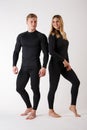 Guy and girl in thermal underwear on a white background Royalty Free Stock Photo