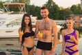 Guy with girls at the yacht club. Royalty Free Stock Photo