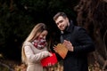 Guy gives a girl box with a gift Royalty Free Stock Photo