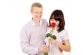 The guy gives a girl a rose, makes a proposal