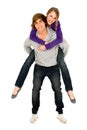 Guy giving girlfriend a piggyback ride Royalty Free Stock Photo