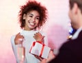 Guy Giving Girlfriend Xmas Present Celebrating Holidays Standing Indoor