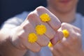 Guy giving a punch with yellow flowers