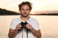 Men with binocularus in his handds on the yacht Royalty Free Stock Photo