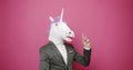 Guy in Gray Suits with Unicorn Mask have a good idea. proves and looks