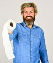 Guy having fun with toilet paper. Softness strength and absorbency. Prevent Toilet Paper Hoarding. Man hold toilet paper