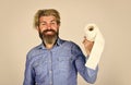 Guy having fun with toilet paper. Softness strength and absorbency. Prevent Toilet Paper Hoarding. Man hold toilet paper