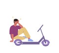 Guy without helmet fell off electric scooter and holding his head while sitting on the ground