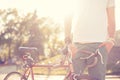 Guy holding vintage race bike