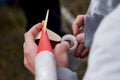 The guy holds in his hands a model of a rocket and prepares it for flight