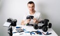 The guy keeps a video blog about radio controlled car models. On the table are tools for repair. Royalty Free Stock Photo