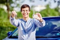 Guy with keys and driving license Royalty Free Stock Photo