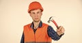 Guy knoking hammer professional master repair wear helmet uniform, good tools concept