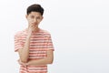 Guy knows what we need. Portrait of smart and creative good-looking determined young asian male student in striped t