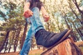 A guy lacing shoes, wide-angle photo, bottom view