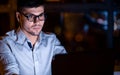Guy At Laptop Working Coding Website Overnight Sitting Indoor Royalty Free Stock Photo