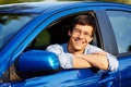 Guy looking out through open car window Royalty Free Stock Photo