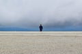 Guy in low clouds near the Transalpina serpentines road DN67C. This is one of the most beautiful alpine routes in Romania Royalty Free Stock Photo