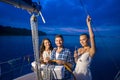 Guy made a trip for the girls on the yacht. Royalty Free Stock Photo