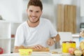 Guy making sandwhich at home Royalty Free Stock Photo