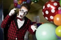 Guy mime emotionally burst balloons Royalty Free Stock Photo