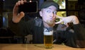 Guy and phone in the bar Royalty Free Stock Photo