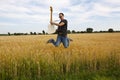 Guy Playing Electric Guitar In Wheat Field Royalty Free Stock Photo