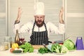 Guy in professional uniform ready cook. Master chef concept. Culinary challenge. Chef handsome hipster. Get ready. Man Royalty Free Stock Photo