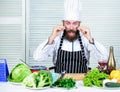 Guy in professional uniform ready cook. Master chef concept. Culinary is exciting. Chef handsome hipster. Get ready. Man Royalty Free Stock Photo