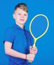 Guy with racket enjoy game. Future champion. Dreaming about sport career. Athlete kid tennis racket on blue background