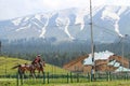 A guy riding a pony at Gulmarg town, Jammu and Kashmir, India