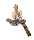 Guy's playing didgeridoo