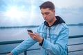 A guy on a scooter with a phone Royalty Free Stock Photo