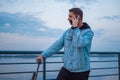 A guy on a scooter with a phone Royalty Free Stock Photo