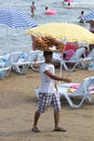 Guy selling Turkish Bagel Simit at Kizkalesi Beach