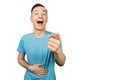 Guy shows hand, laugh and mock at someone on a isolated white background Royalty Free Stock Photo