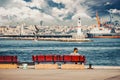 A guy sits on a bench overlooking the Bosphorus in Istanbul Royalty Free Stock Photo