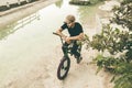 Guy sitting on a bmx bike in the city Royalty Free Stock Photo